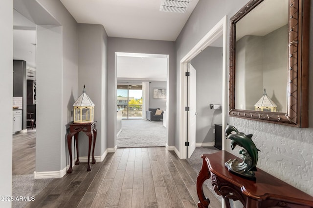 2425 W Bronco Butte Trl Unit 2028, Phoenix, AZ 85085 - corridor featuring dark wood finished floors and baseboards