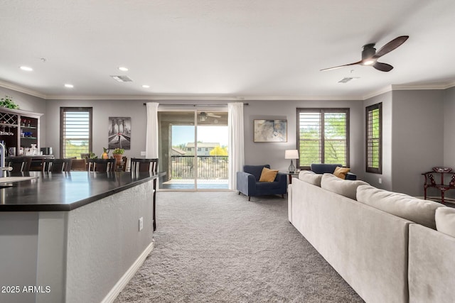 2425 W Bronco Butte Trl Unit 2028, Phoenix, AZ 85085 - carpeted living area featuring crown molding, recessed lighting, plenty of natural light, and ceiling fan