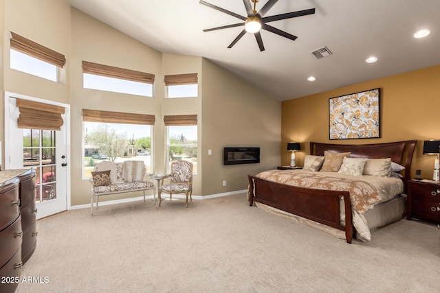 bedroom featuring access to exterior, light carpet, high vaulted ceiling, baseboards, and recessed lighting