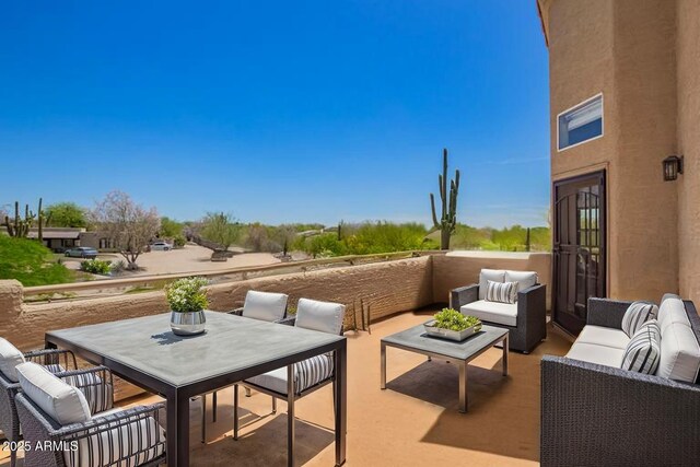 view of patio with outdoor lounge area and outdoor dining area