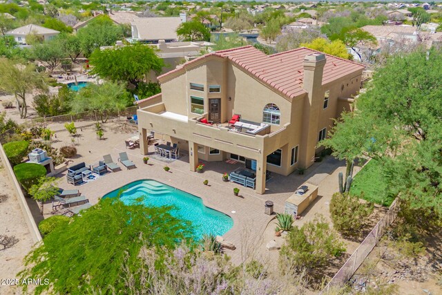 view from above of property featuring a pool