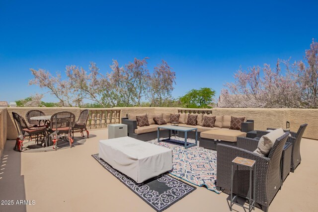 view of patio / terrace with an outdoor hangout area and outdoor dining area