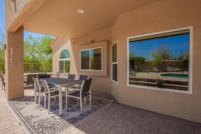 view of patio / terrace with fence and outdoor dining area
