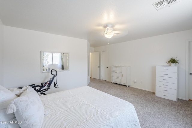 941 E Desert Moon Trl, San Tan Valley, AZ 85143 - bedroom featuring light colored carpet and a ceiling fan