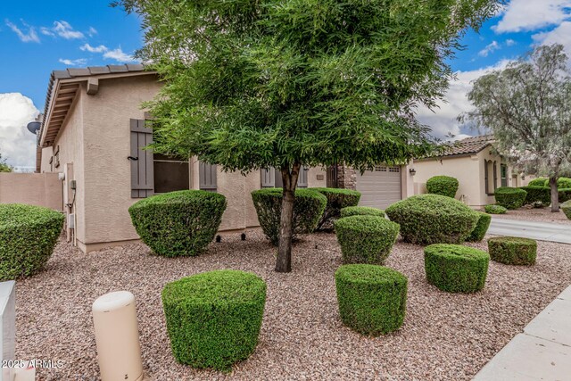 19571 E Strawberry Dr, Queen Creek, AZ 85142 - view of front of property featuring stucco siding, a tiled roof, and a garage