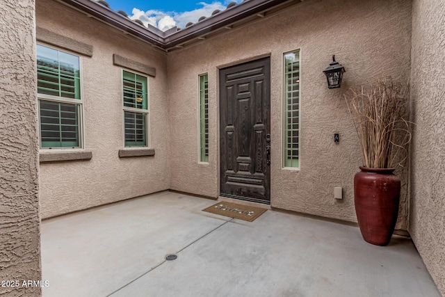 19571 E Strawberry Dr, Queen Creek, AZ 85142 - entrance to property with stucco siding and a patio area