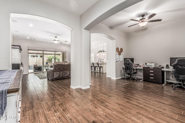 19571 E Strawberry Dr, Queen Creek, AZ 85142 - office area with recessed lighting, baseboards, arched walkways, a ceiling fan, and wood finished floors
