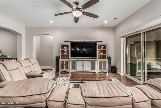 19571 E Strawberry Dr, Queen Creek, AZ 85142 - living area featuring a ceiling fan, wood finished floors, visible vents, arched walkways, and recessed lighting
