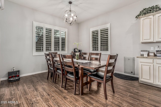 19571 E Strawberry Dr, Queen Creek, AZ 85142 - dining space with baseboards, a notable chandelier, and dark wood-type flooring