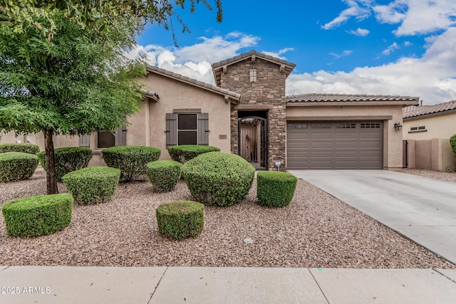 19571 E Strawberry Dr, Queen Creek, AZ 85142 - view of front facade with stucco siding, a tile roof, a garage, and driveway
