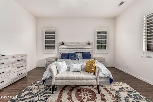 19571 E Strawberry Dr, Queen Creek, AZ 85142 - bedroom featuring dark wood-style floors, baseboards, and visible vents