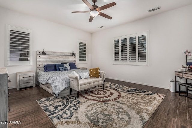 19571 E Strawberry Dr, Queen Creek, AZ 85142 - bedroom with a ceiling fan, dark wood-type flooring, baseboards, and visible vents