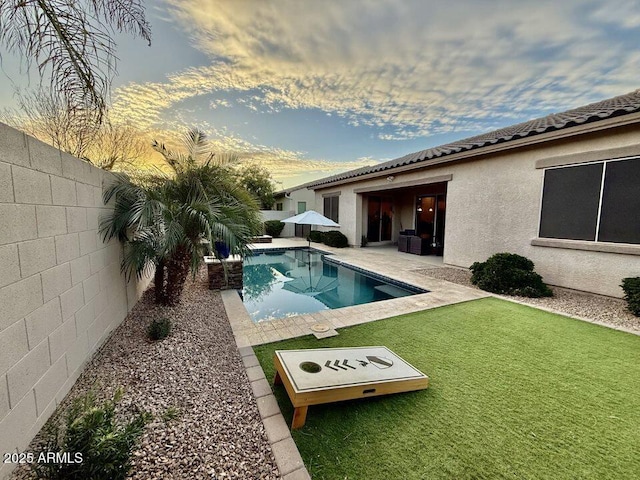 19571 E Strawberry Dr, Queen Creek, AZ 85142 - view of pool with a fenced backyard, a fenced in pool, a yard, and a patio area