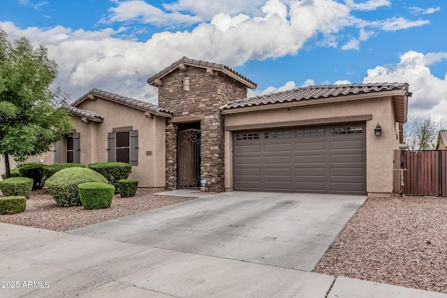 19571 E Strawberry Dr, Queen Creek, AZ 85142 - view of front of home with a tile roof, concrete driveway, stucco siding, an attached garage, and a gate