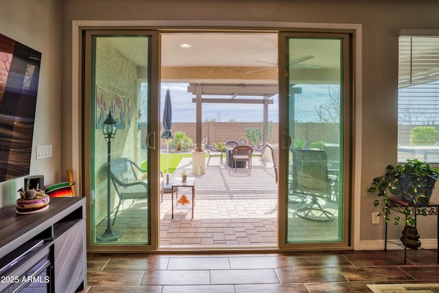 entryway with wood finish floors