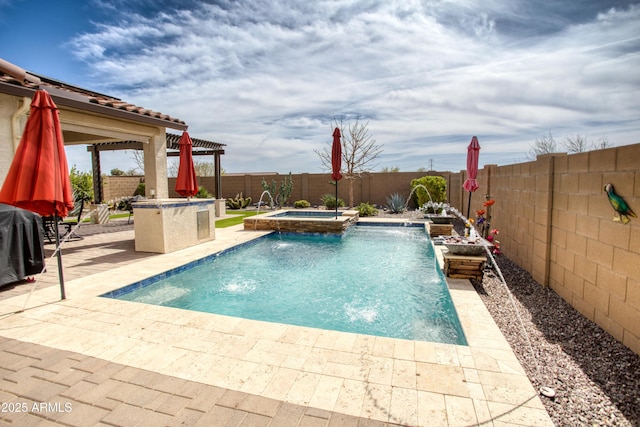 view of swimming pool with a patio, a fenced backyard, and a pool with connected hot tub