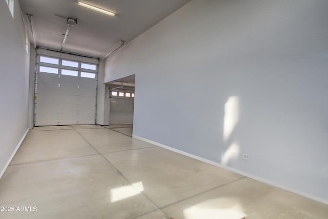 garage featuring baseboards