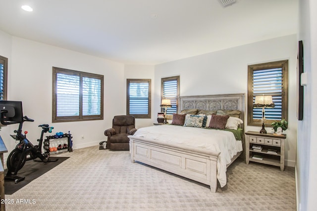 carpeted bedroom with baseboards