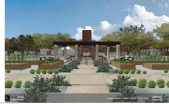 view of community featuring a garden