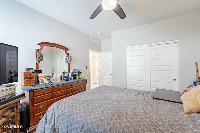 bedroom featuring a closet and ceiling fan