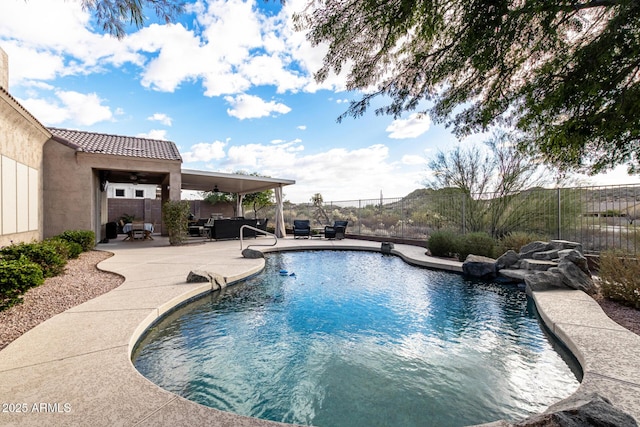 view of pool featuring a patio