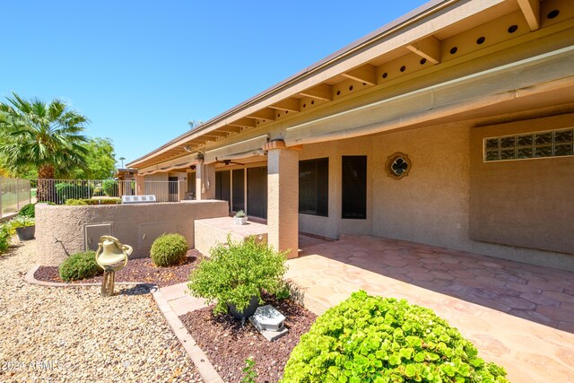 rear view of house featuring a patio