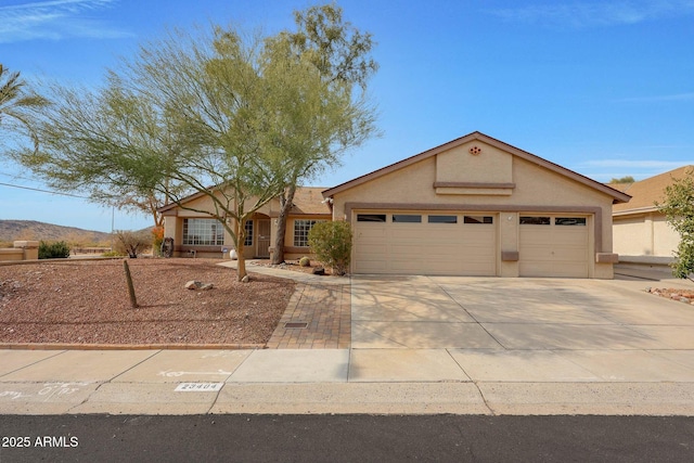 single story home with a garage