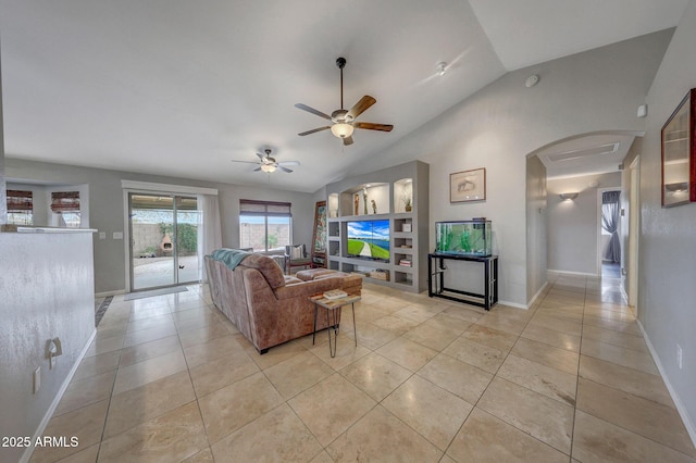 living room with vaulted ceiling, light tile patterned floors, and ceiling fan