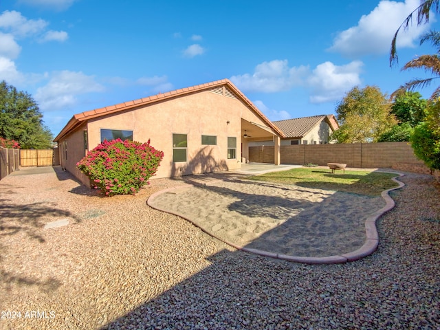 rear view of property with a patio