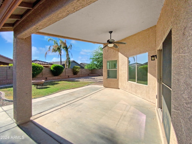 view of patio featuring ceiling fan