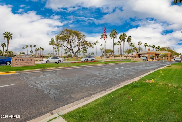 view of road with curbs