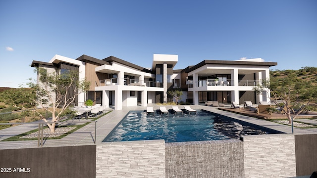 outdoor pool featuring a patio