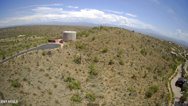 drone / aerial view featuring a mountain view