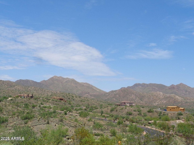 view of mountain feature with a rural view