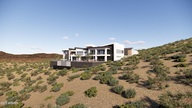 back of house featuring stucco siding