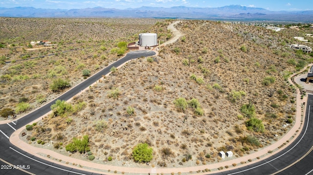 aerial view with a desert view and a mountain view