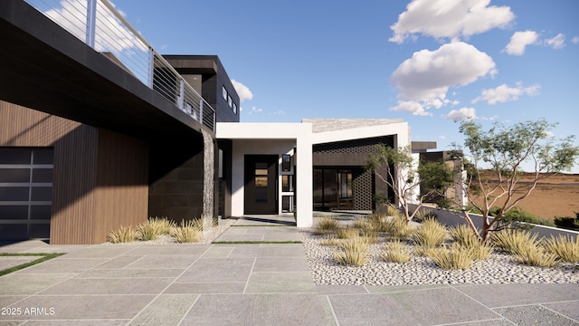 doorway to property featuring stucco siding