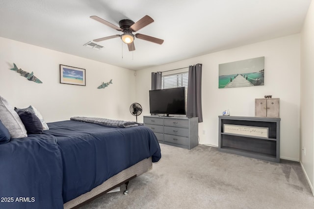 carpeted bedroom with visible vents and ceiling fan