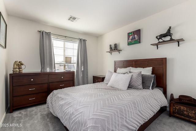 carpeted bedroom with visible vents