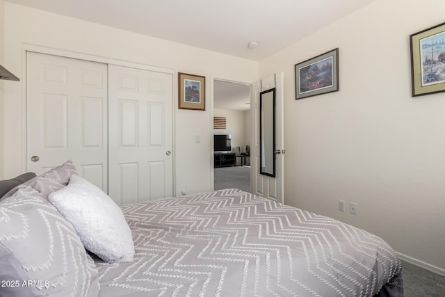 carpeted bedroom featuring a closet