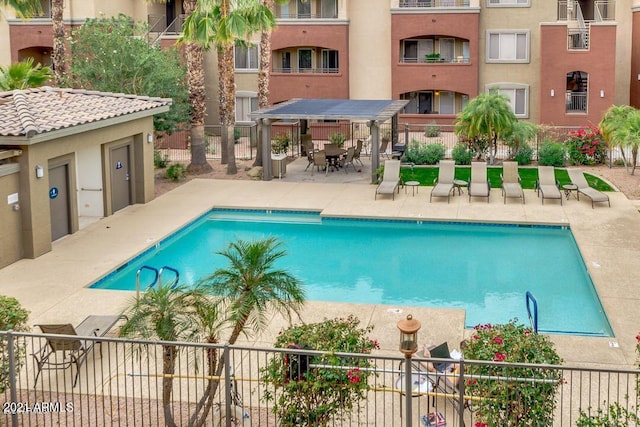 view of pool featuring a patio