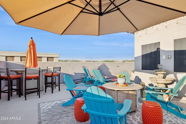 view of patio / terrace featuring an outdoor bar