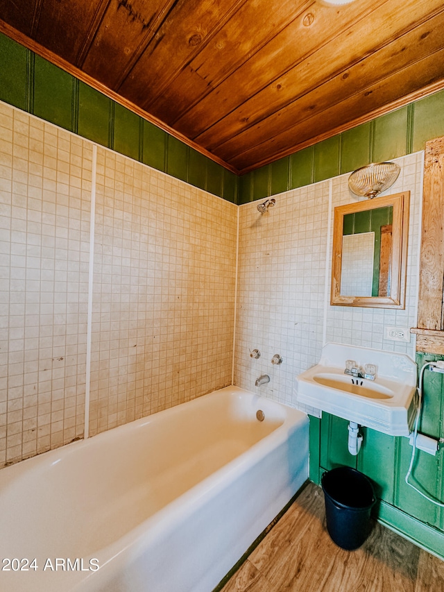 bathroom featuring washtub / shower combination, wood ceiling, sink, and hardwood / wood-style flooring