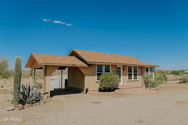 view of front of house featuring a carport