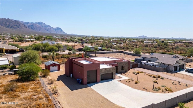 drone / aerial view featuring a mountain view