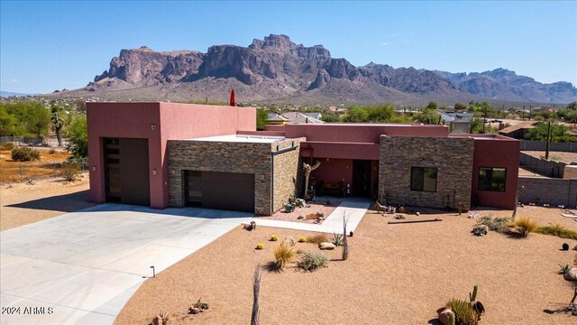 exterior space featuring a mountain view and a garage