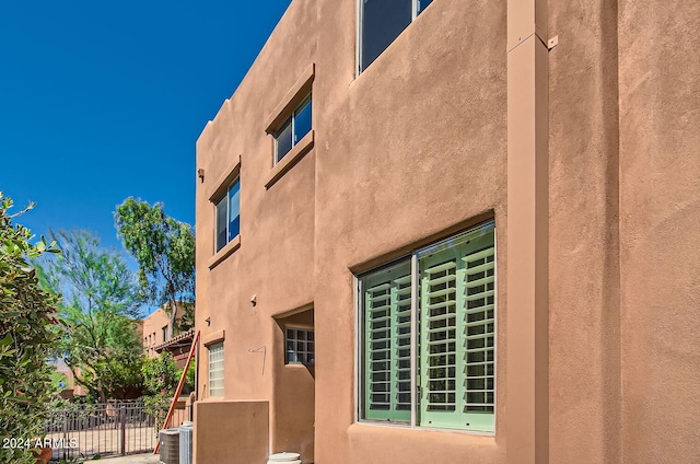 view of home's exterior featuring cooling unit