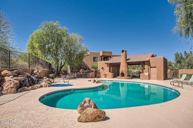 view of pool with a patio