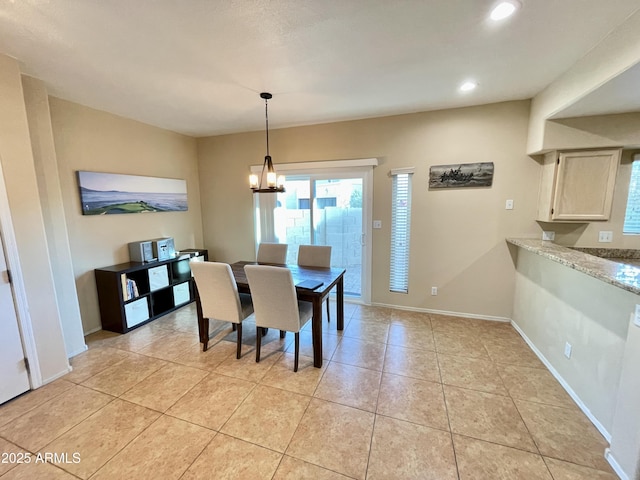 dining space with an inviting chandelier, light tile patterned floors, recessed lighting, and baseboards