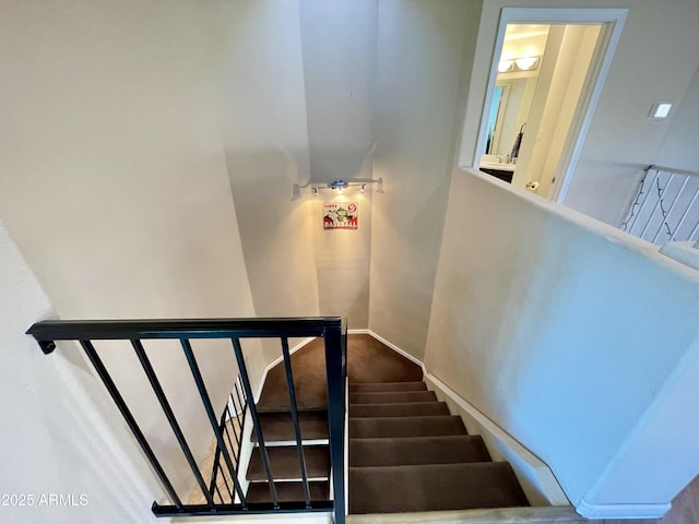 staircase with baseboards